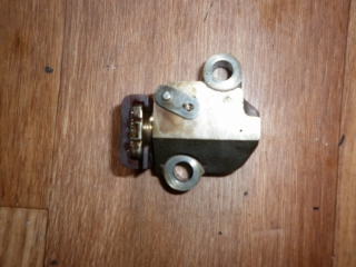 Натяжитель цепи грм